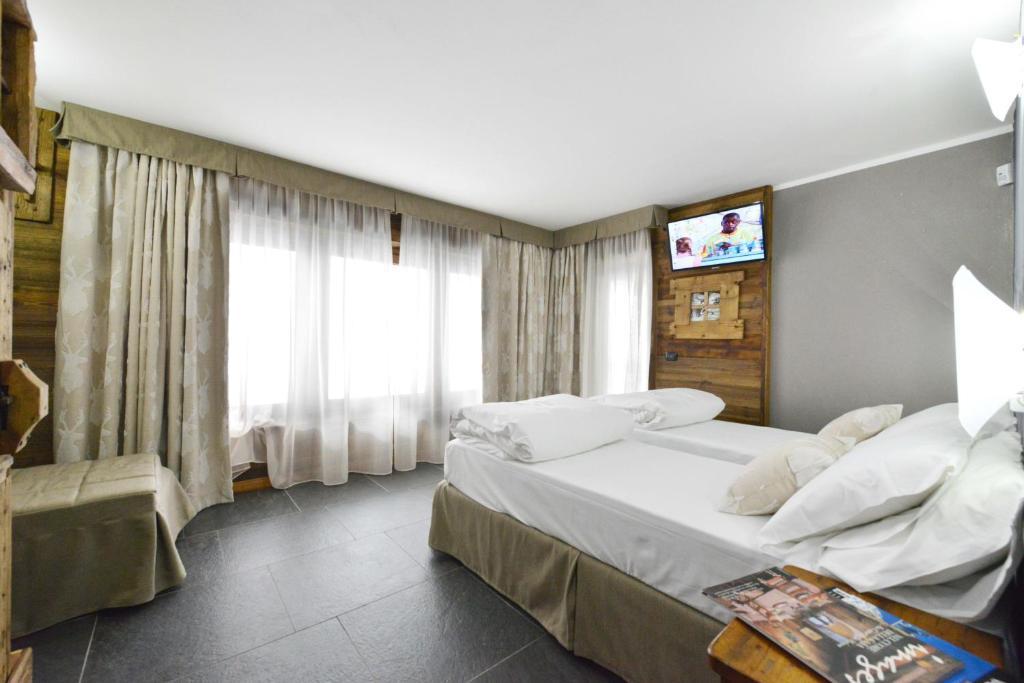 Mollino Rooms เบรยล์-แชร์วิเนีย ห้อง รูปภาพ
