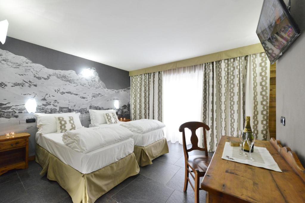Mollino Rooms เบรยล์-แชร์วิเนีย ห้อง รูปภาพ