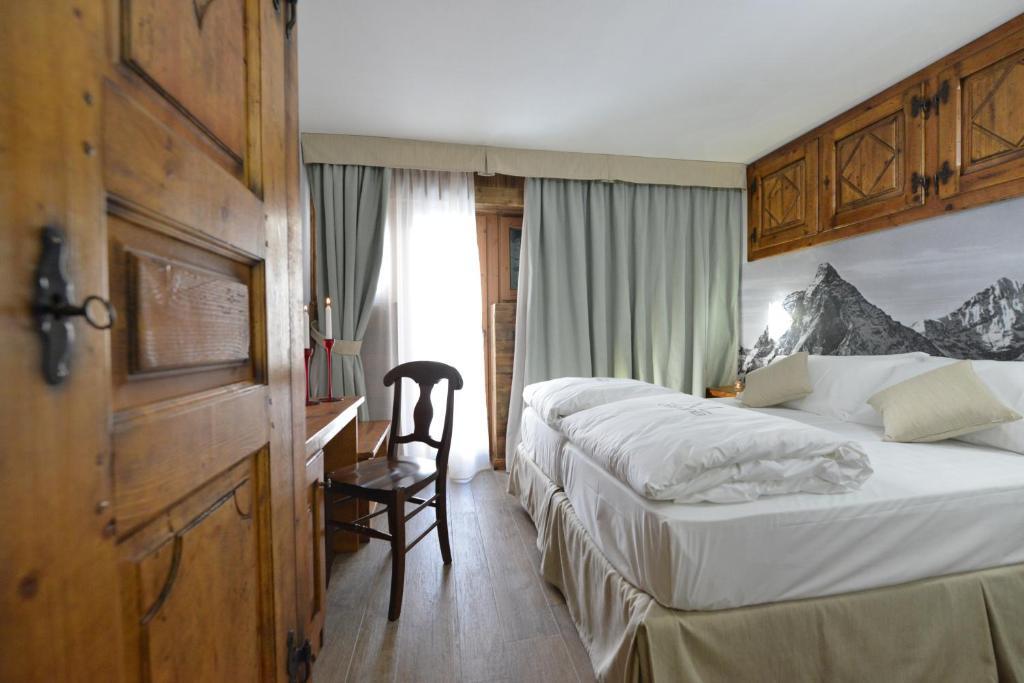 Mollino Rooms เบรยล์-แชร์วิเนีย ห้อง รูปภาพ